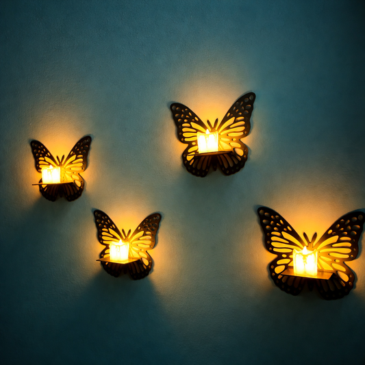 Close-up of the intricate butterfly laser-cut pattern on the wooden wall sconce.