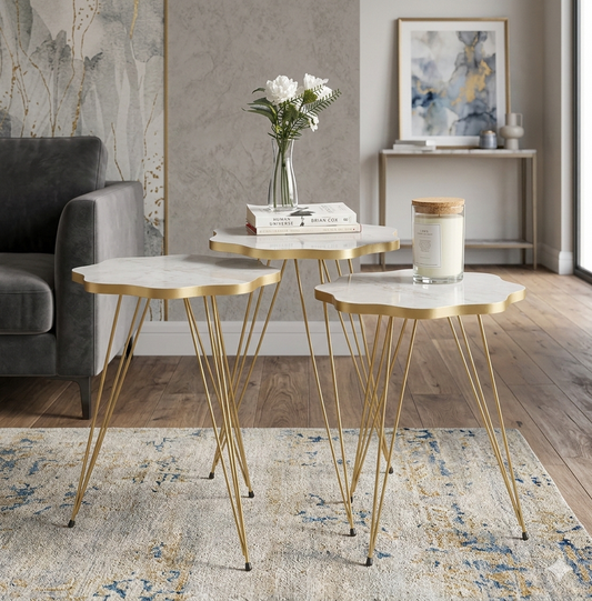 Three-piece round marble effect side table set nested together in a modern living room setting