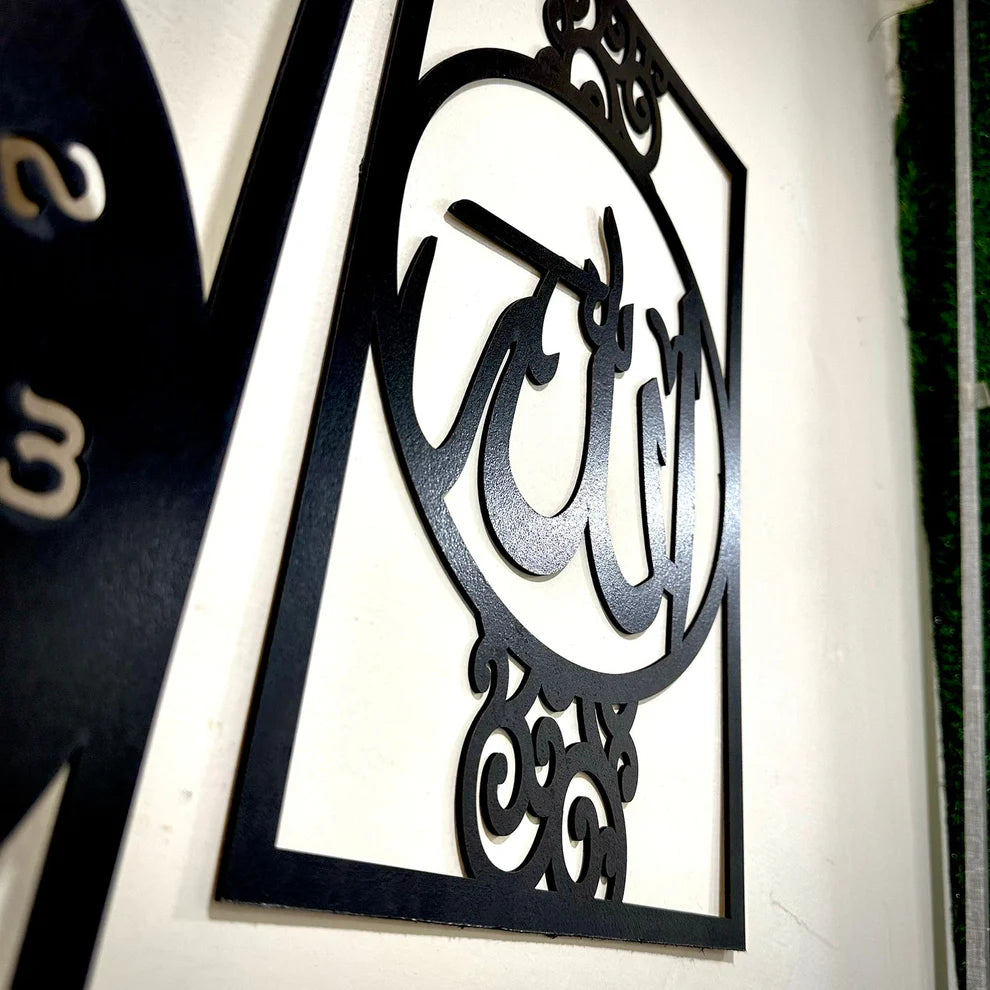 Decorative metal sign with Arabic calligraphy on a white wall