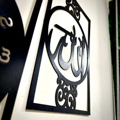 Decorative metal sign with Arabic calligraphy on a white wall